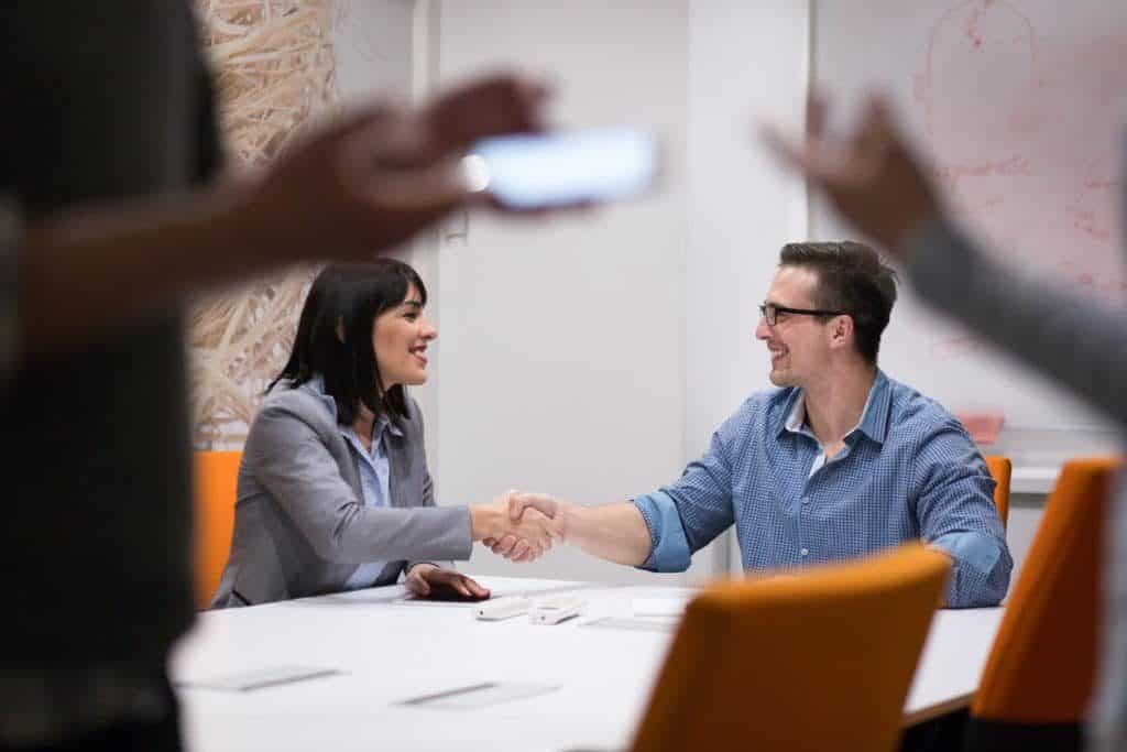 Property manager interviewing prospective tenants