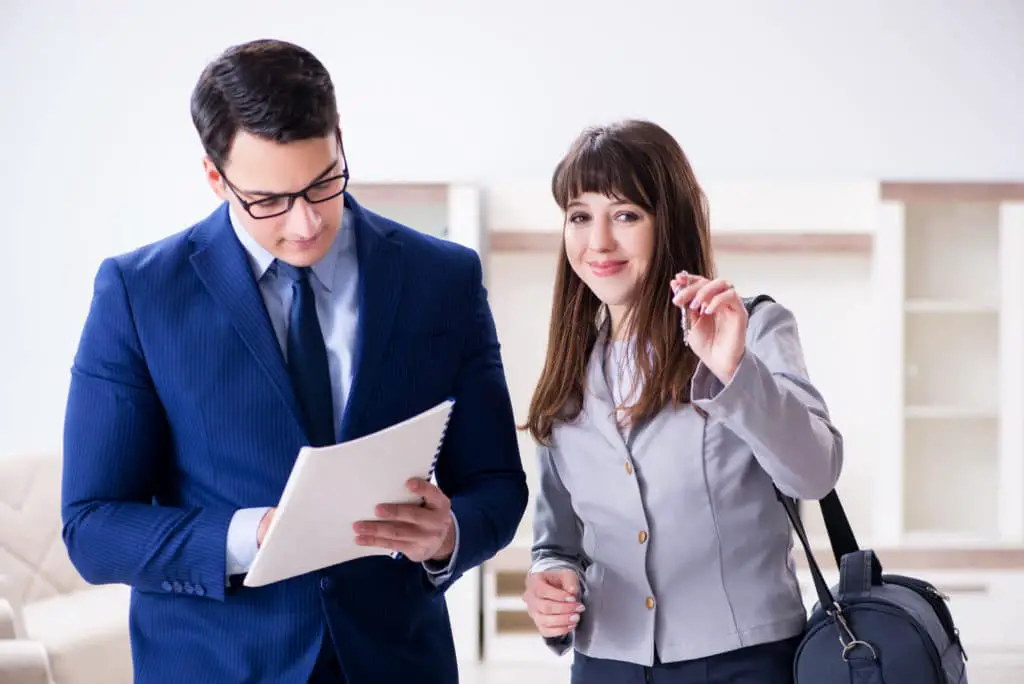 The Real Estate Agent Showing New Apartment To Owner Real Estate Agent Showing New Apartment To Owner