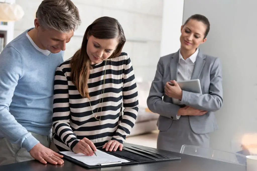 Smiling Young Real Estate Saleswoman