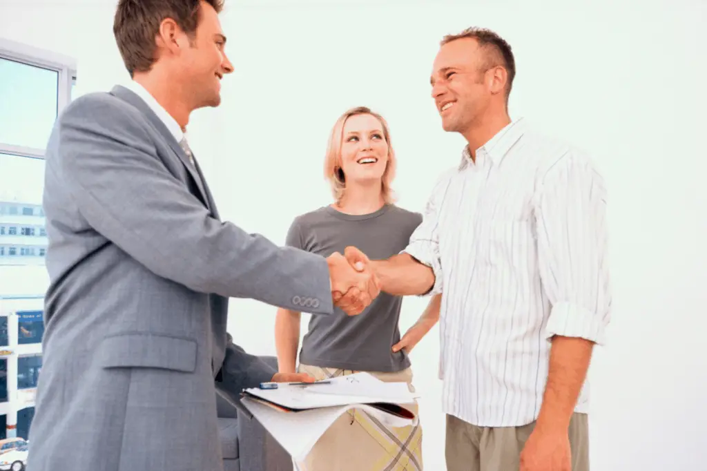 Georgia real estate agent meeting clients