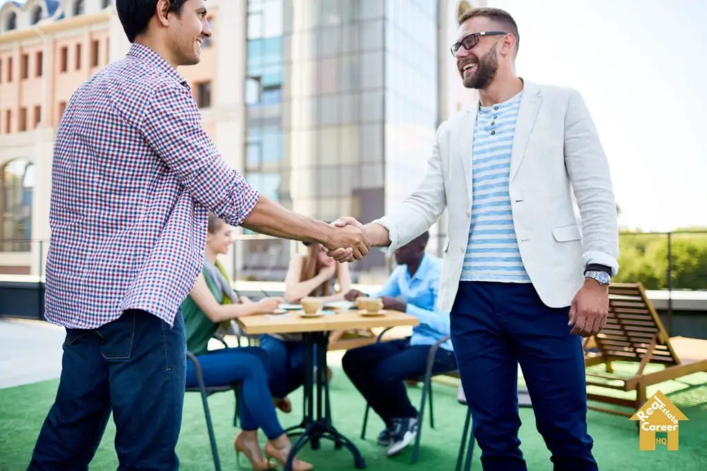 Introverted real estate agent meeting loyal client