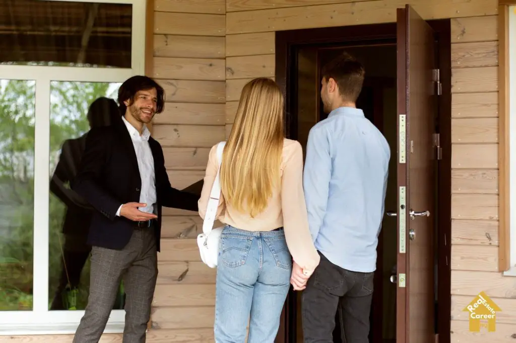 Property manager showing a house to prospective tenants