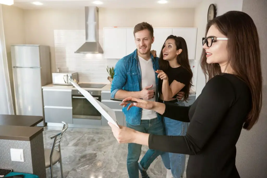 Property manager working on site with tenants